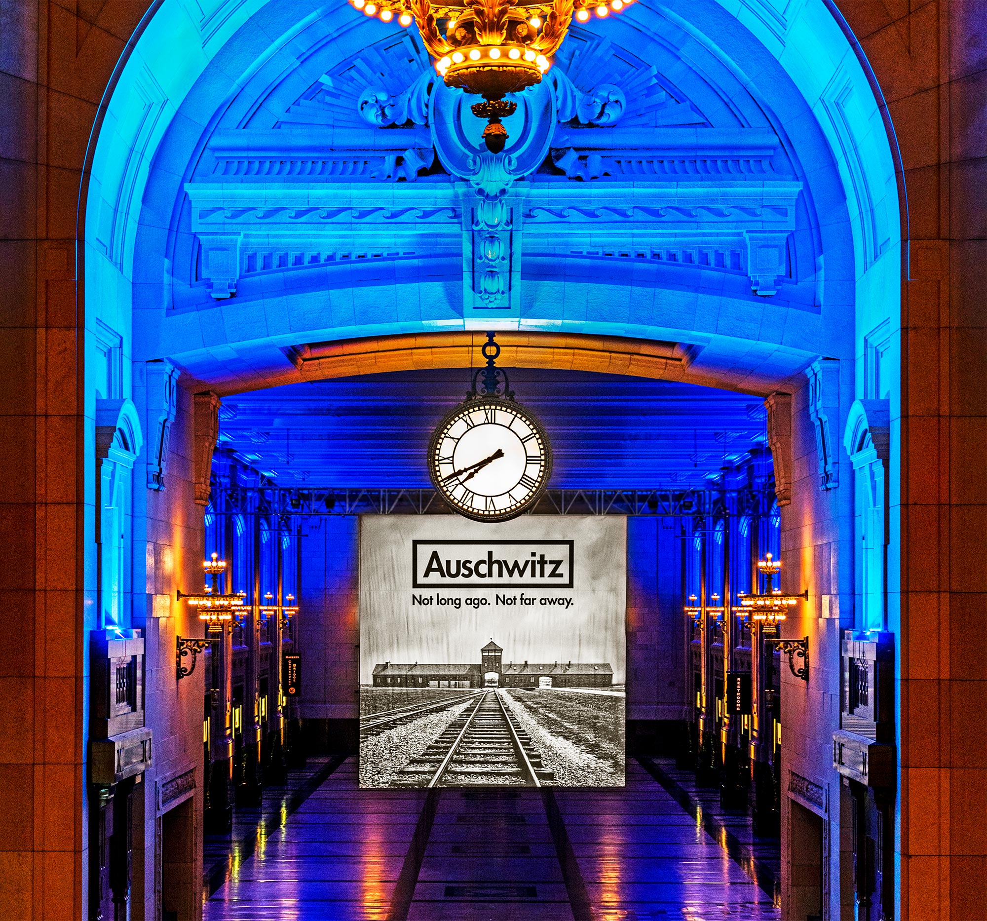 Photo of Grand Plaza with Auschwitz Banner Hanging