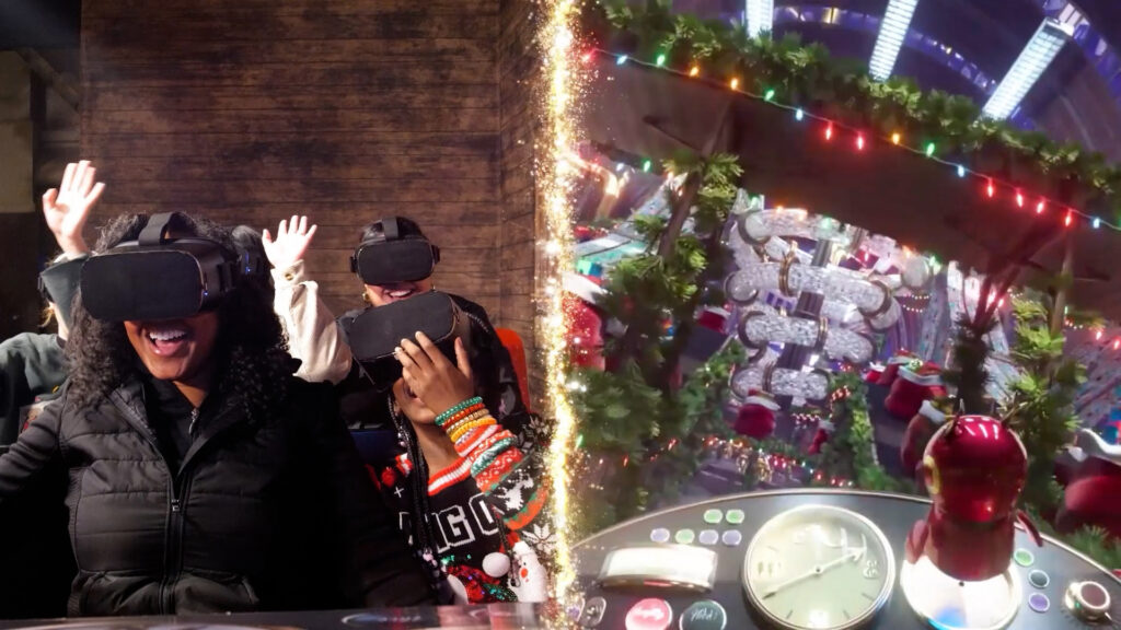 A family enjoying the virtual reality ride inside of Holiday Reflections