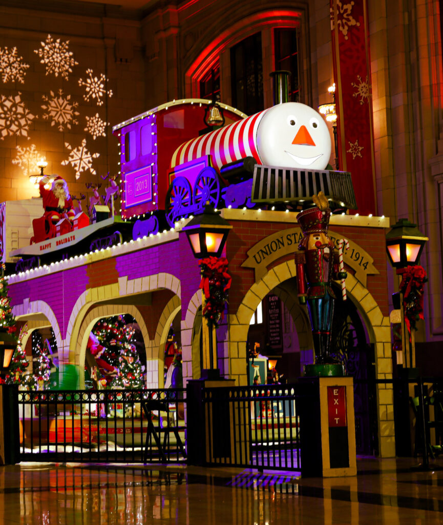 Rudy the Train at night inside of Holiday Reflections