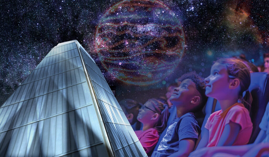 Children viewing in awe at the planetarium with sky scraper in view