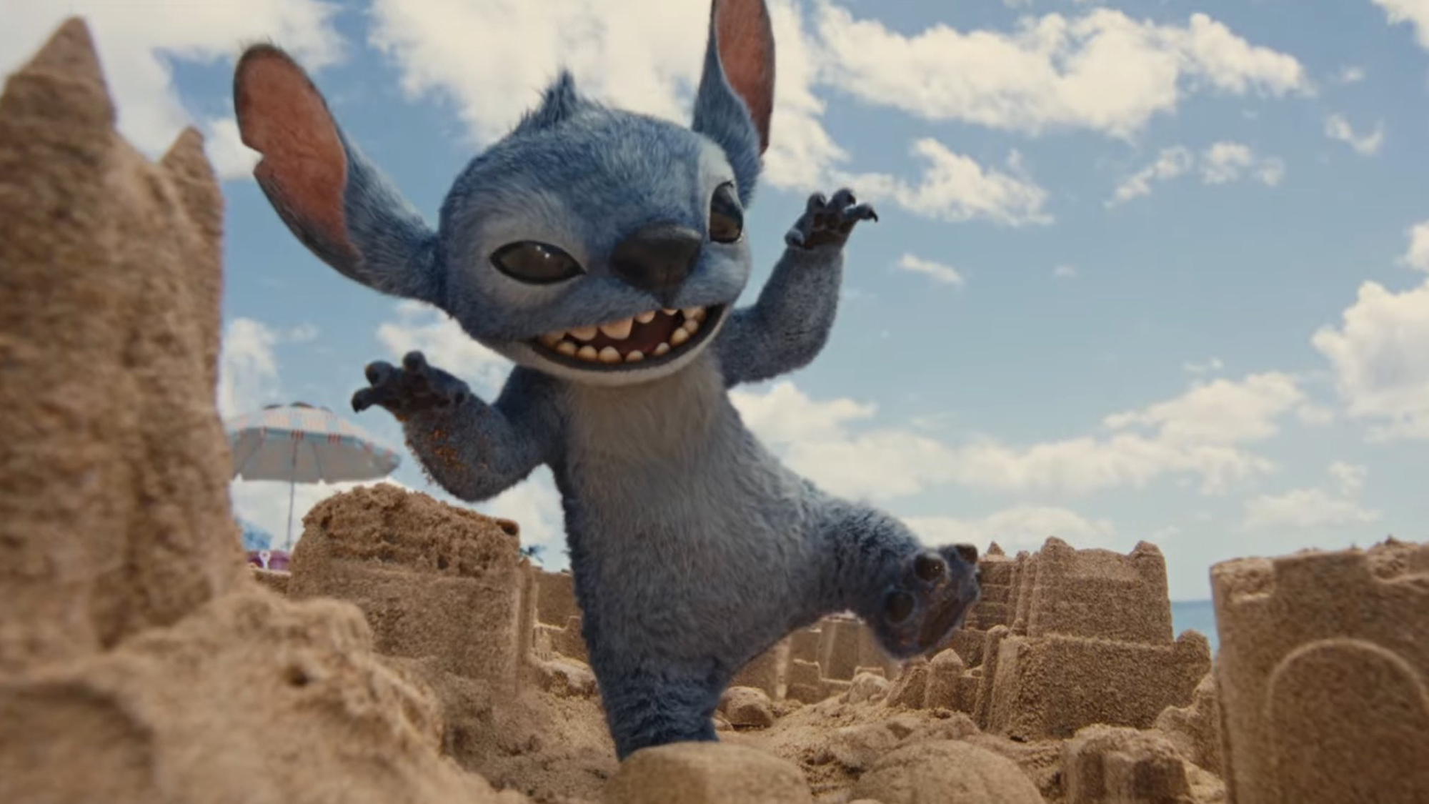 An image of Stitch destroying a sandcastle from the movie Lilo and Stitch.