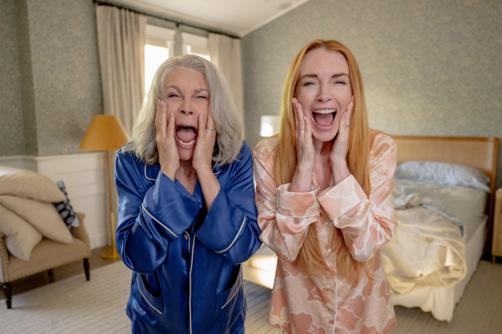 Production still for Freakier Friday showing Jamie Lee Curtis and Lindsay Lohan after switching bodies.