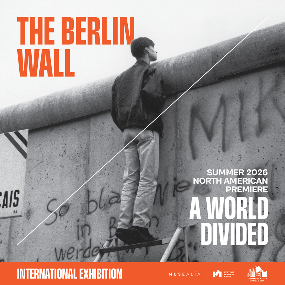 Man looking over the top of the Berlin wall with text The Berlin Wall, Summer 2026 North American Premiere, A World Divided