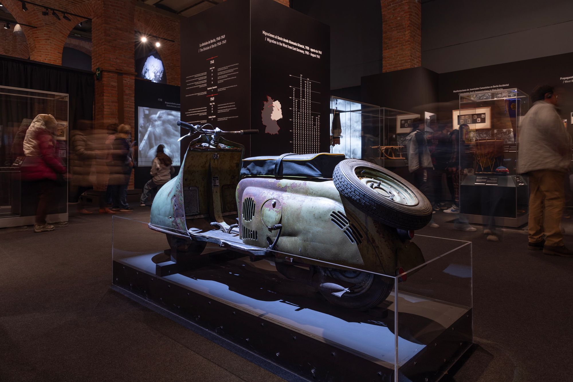 A scooter on display inside of The Berlin Wall. A World Divided.