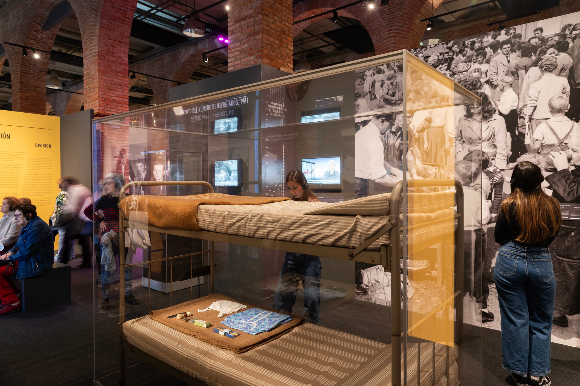 Beds used by East German refugees that are displayed inside of The Berlin Wall. A World Divided.