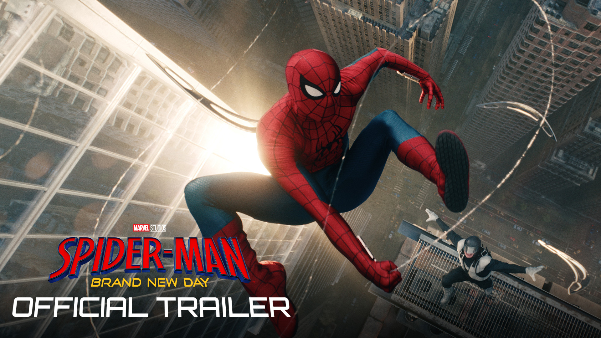Trailer image for Spider-Man Brand New Day showing Spiderman swinging through New York with the text "Official Trailer" over top.